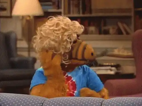 Alf in a Wig on the Couch