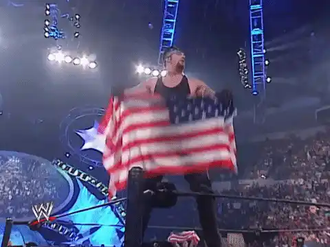 Wrestler Waving American Flag