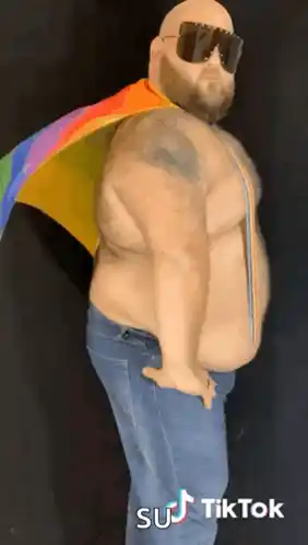 Bearded Bear Guy Slay in Rainbow Cape