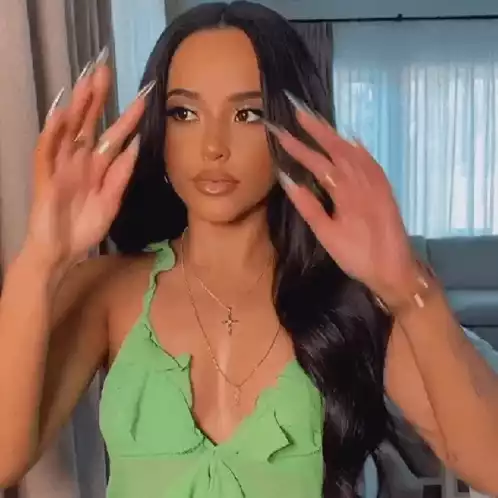 Becky G Posing with Glam Look