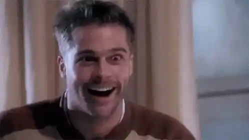 Brad Pitt's Excited Smile in 12 Monkeys