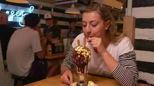 Christy Somers Enjoys a Giant Milkshake