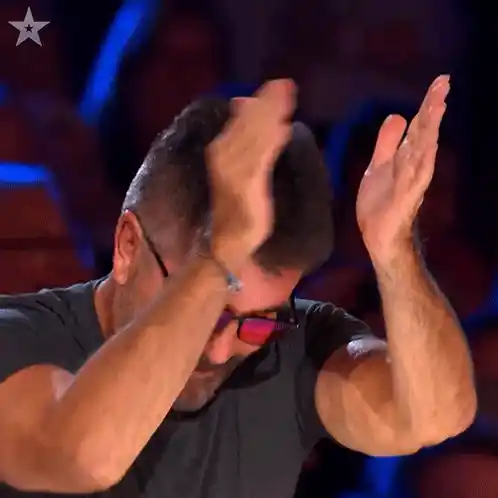 Simon Cowell Clapping Enthusiastically