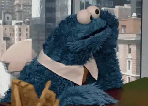 Cookie Monster in Office with Cookie