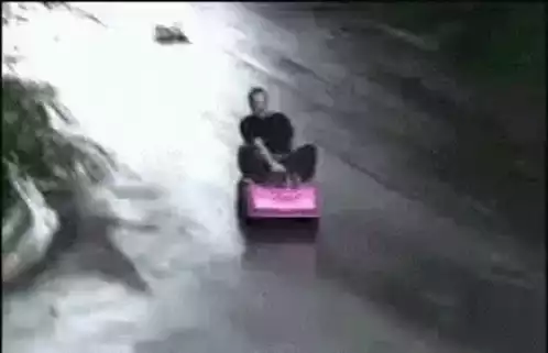 Pink Toy Car Crash on Wet Road