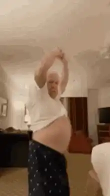 Man Dancing with Exposed Belly
