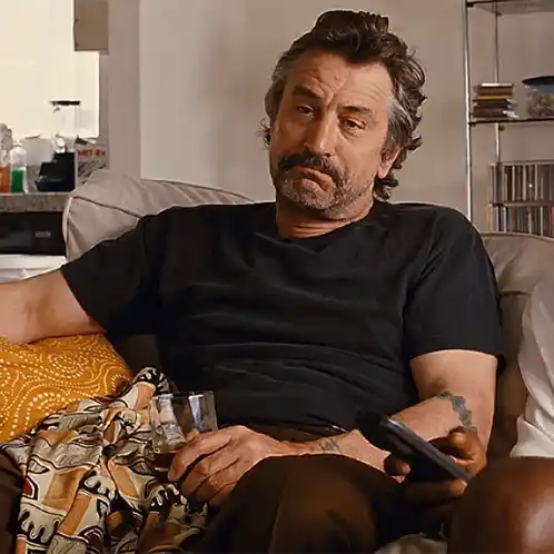 Robert De Niro Relaxing on Couch
