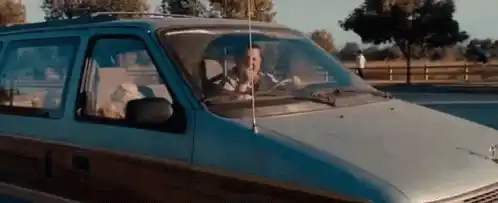 Man Driving Minivan, Feeling It