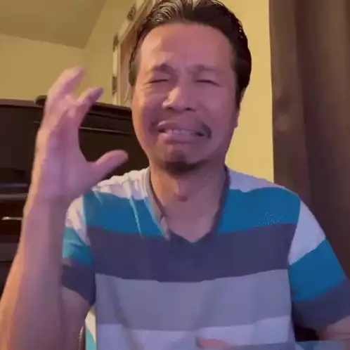 Duc Pham Laughing and Signing (Deaf)