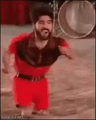 Dwarf Man Dancing in Red