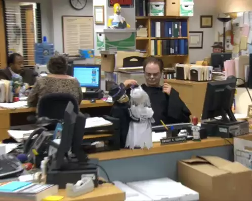 Dwight Schrute Puts on Hooded Robe