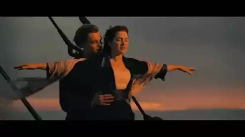 Eric Sur and woman in iconic ship pose