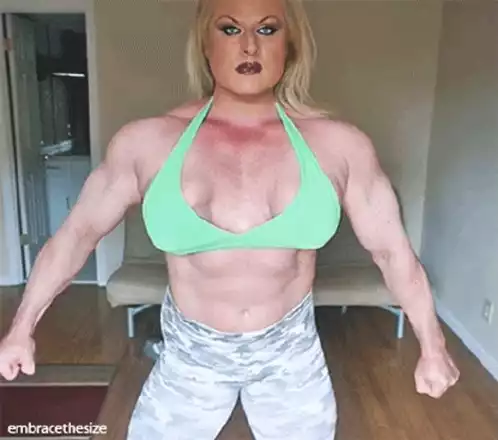 Female Bodybuilder Flexing Muscles