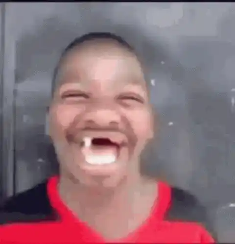 Boy with Funny Vampire Smile