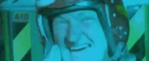 Man in Helmet Says Hello Boys