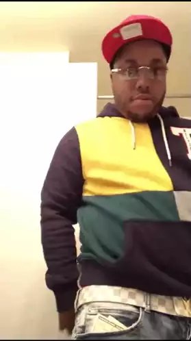 Man Pulls Money from Pocket