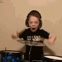 Energetic Kid Playing Drums