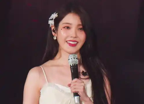 IU in Jakarta: Smiling & Finger Heart