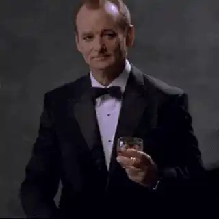 Josh in Tuxedo, Cheers with Whiskey