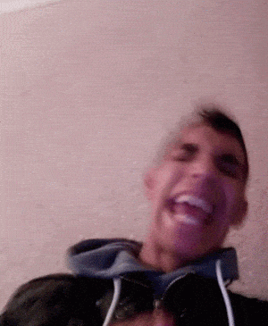 Man Laughing and Making a Funny Face