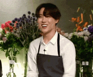 BTS J-Hope Smiling in Flower Shop