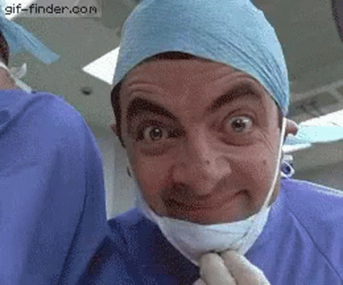 Man in Surgical Mask Making Funny Face