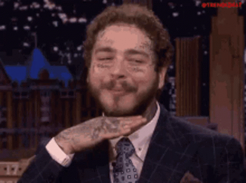 Post Malone's Happy Smile & Hand Gesture