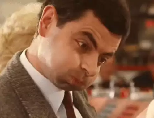 Mr. Bean's Iconic Puffed Cheek Funny Face