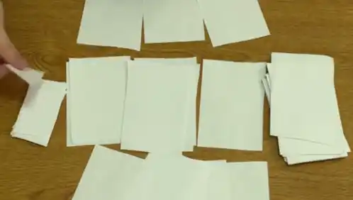 Paper 4 Paper Four: Hands Organizing Sheets