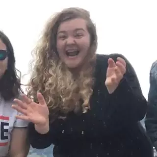 Excited Woman Waving