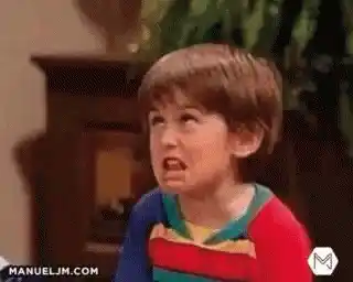 Boy Makes Funny Face in Front of TV